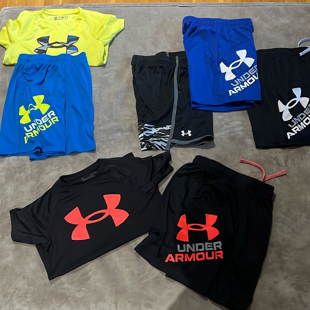 2 Under Armour Shirts-youth medium. 5 Under Armour shorts-youth medium